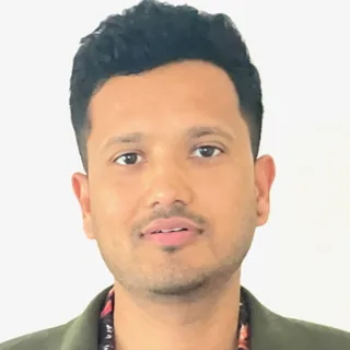 Photo of Albert Khadka, a dedicated support worker at Unique Needs, Disability Support Service in Launceston Tasmania